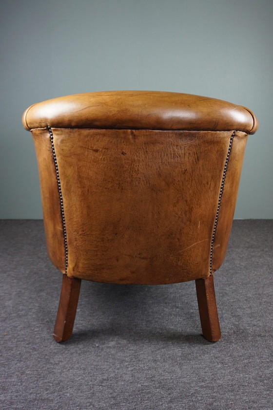 Image 1 of Sturdy sheepskin club chair