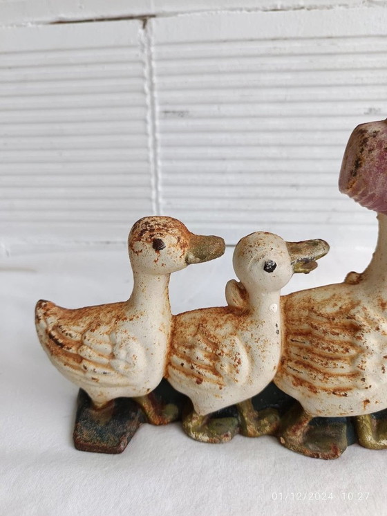 Image 1 of Duck door stop - courier