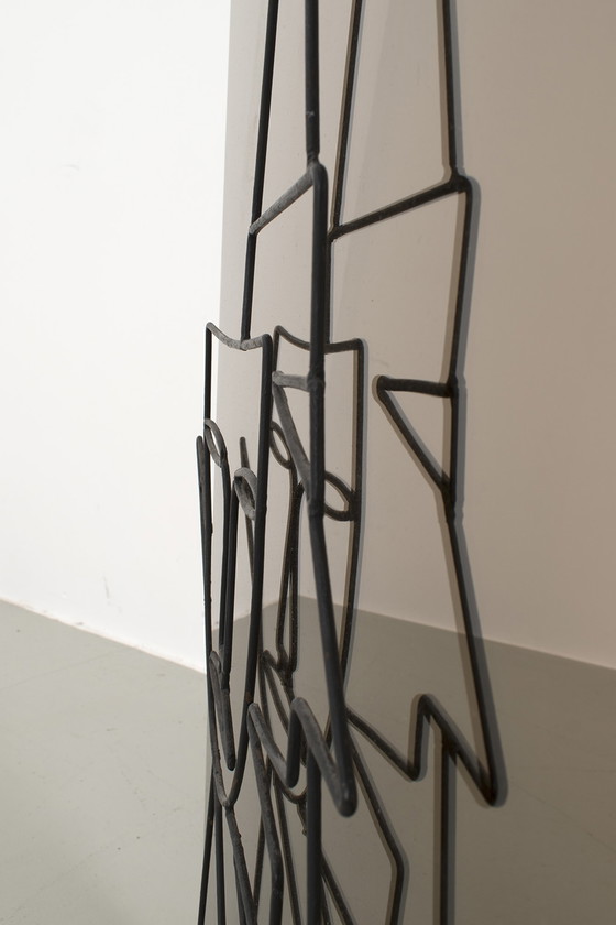 Image 1 of Sculpture on tinted mirror