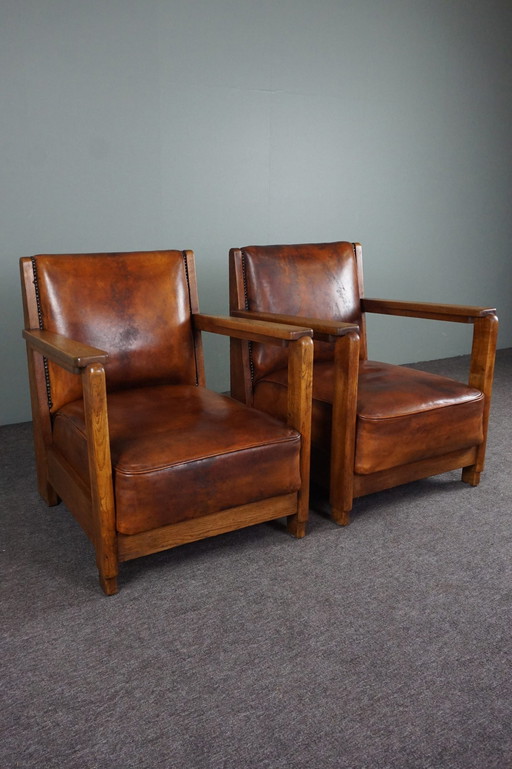 Set of 2 Art Deco / Amsterdam school sheep leather armchairs